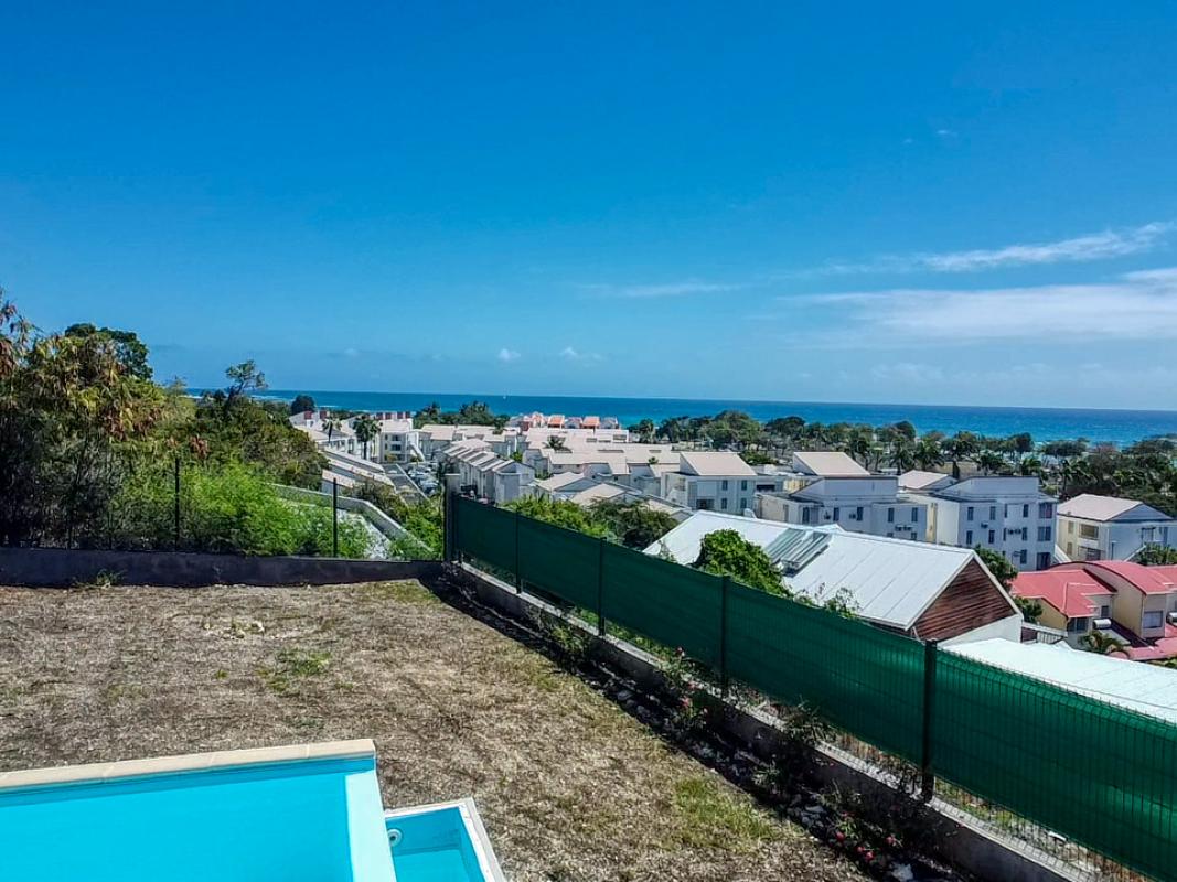 Location villa Topaze 2 chambres 4 personnes vue sur mer piscine à St François en Guadeloupe - vue ensemble mer
